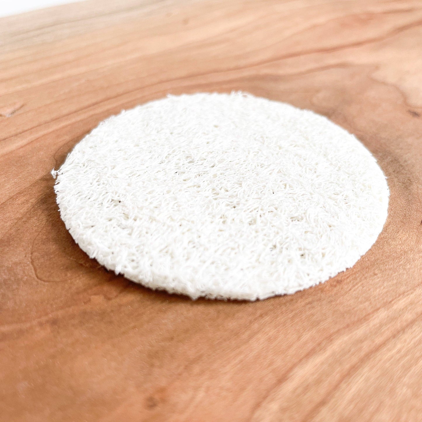 Loofah Pad: Round Facial Pad that's Biodegradable, available at The Mirrored Past.