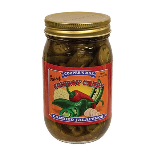 Jar of Cooper's Mill Sweet Cowboy Candy Candied Jalapenos on a white background