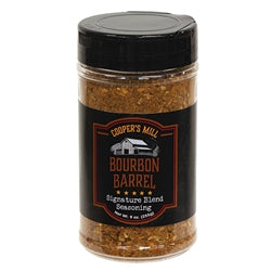 Jar of bourbon barrel-aged coffee with a black lid and label on a white background