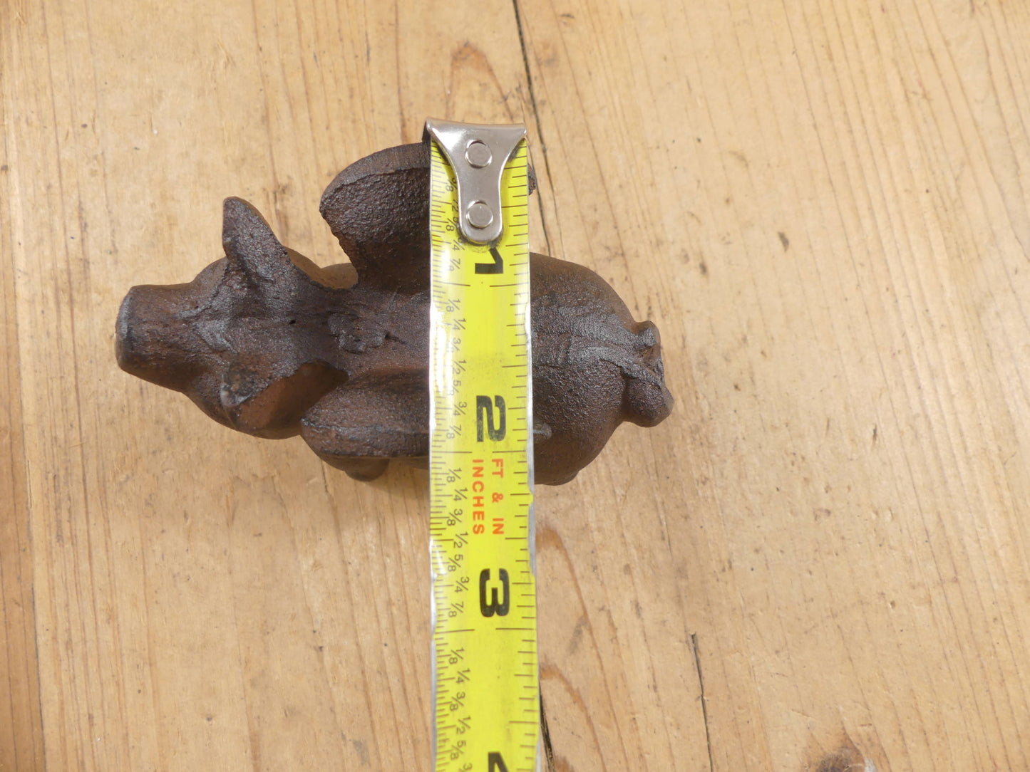 Flying Pig Cast Iron Decor: More Than Just a Paper Weight - The Mirrored Past