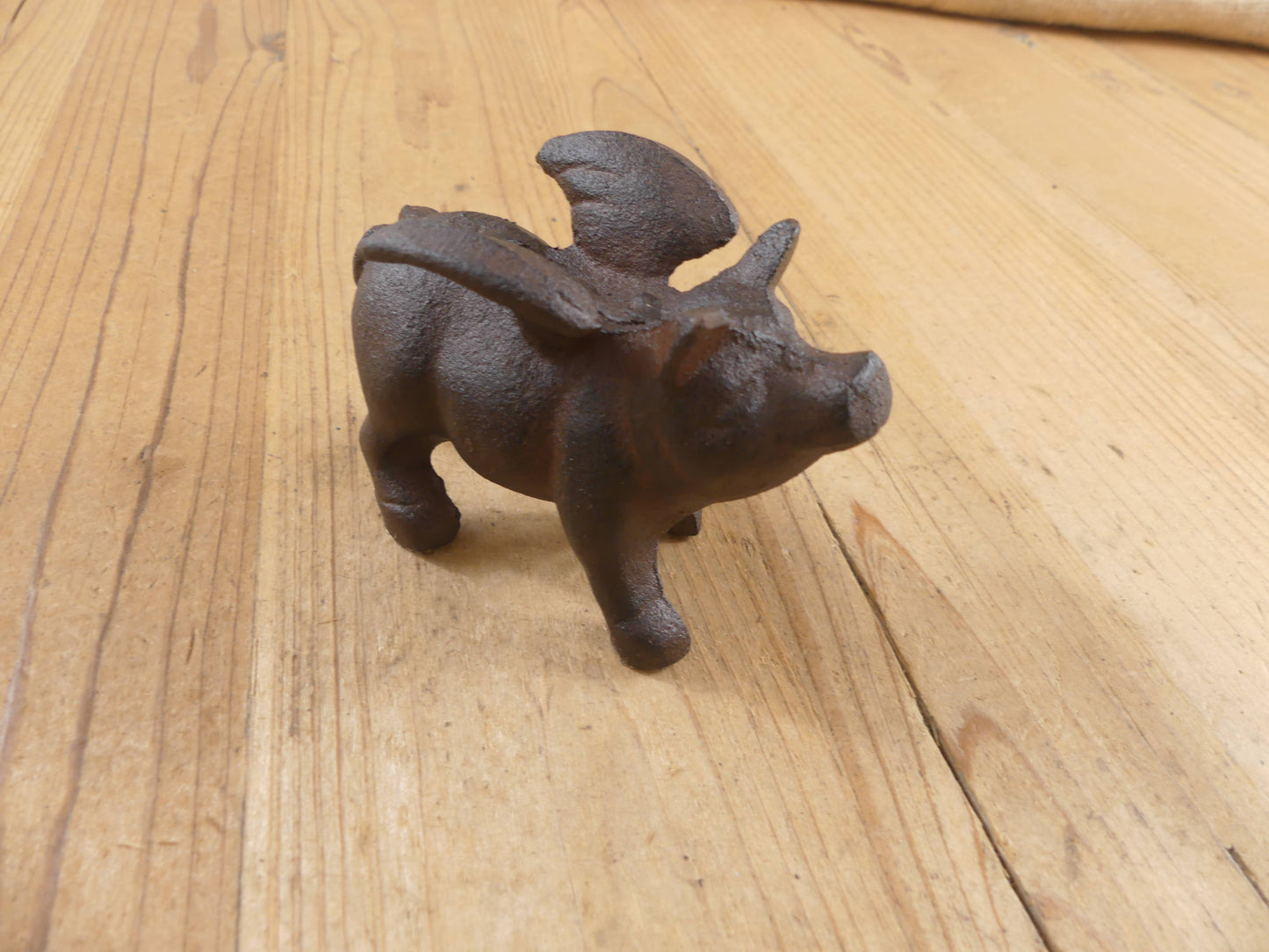 Flying Pig Cast Iron Decor: More Than Just a Paper Weight - The Mirrored Past