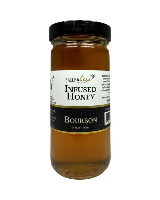 Jar of bourbon-infused honey with a label on a white background