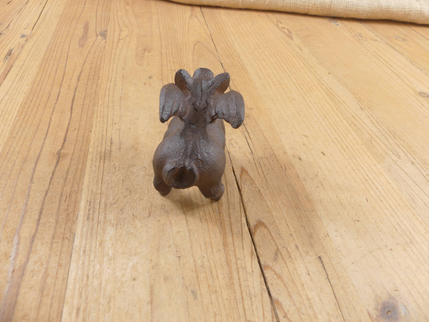Flying Pig Cast Iron Decor: More Than Just a Paper Weight - The Mirrored Past