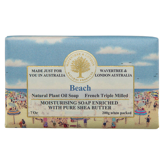 Bar of soap with beach scene design and branding on a white background