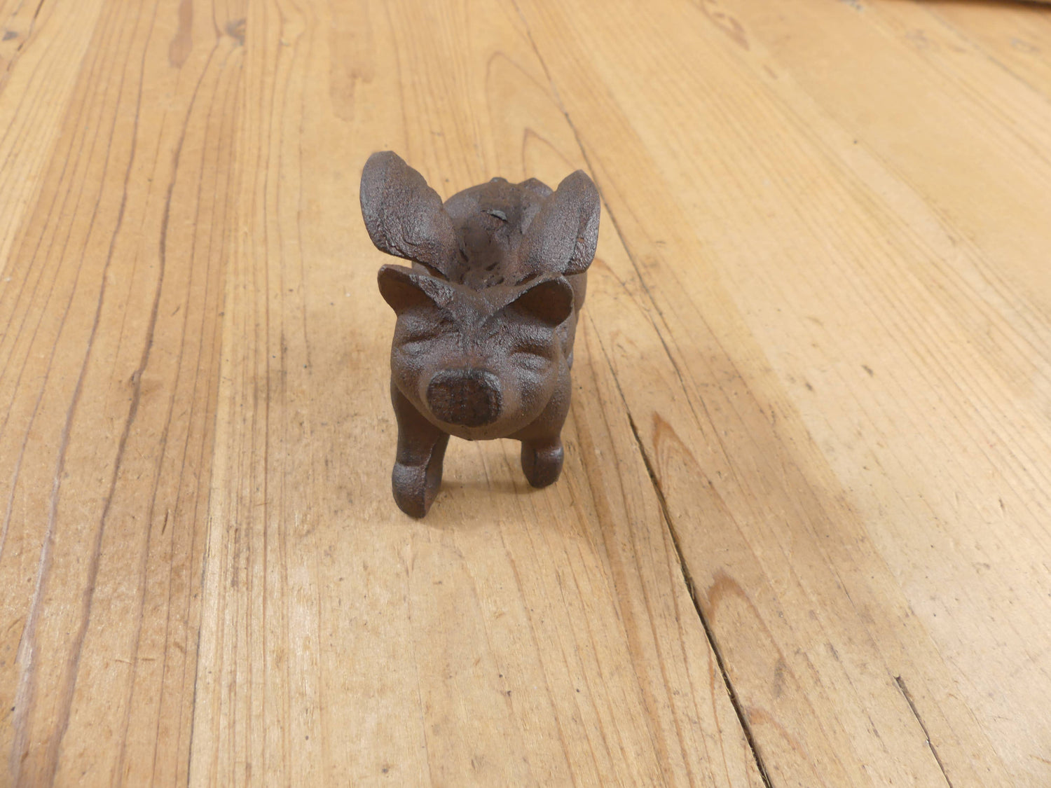 Flying Pig Cast Iron Decor: More Than Just a Paper Weight - The Mirrored Past
