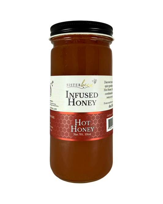 Jar of Sister Bee Infused Honey on a white background
