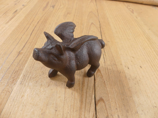 Flying Pig Cast Iron Decor: More Than Just a Paper Weight - The Mirrored Past