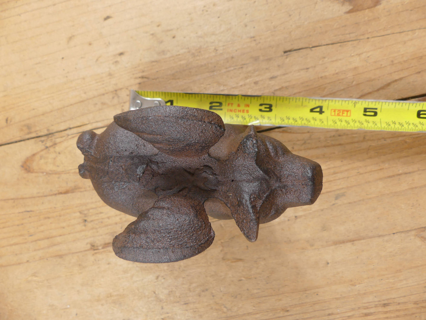 Flying Pig Cast Iron Decor: More Than Just a Paper Weight - The Mirrored Past