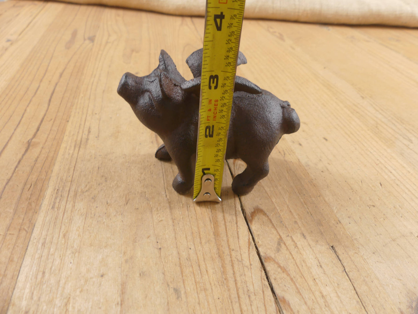 Flying Pig Cast Iron Decor: More Than Just a Paper Weight - The Mirrored Past