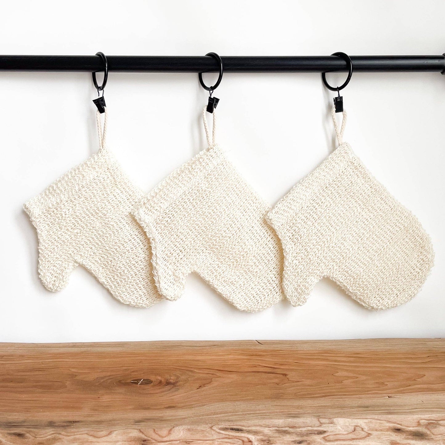 White mesh scrubber with a handle 