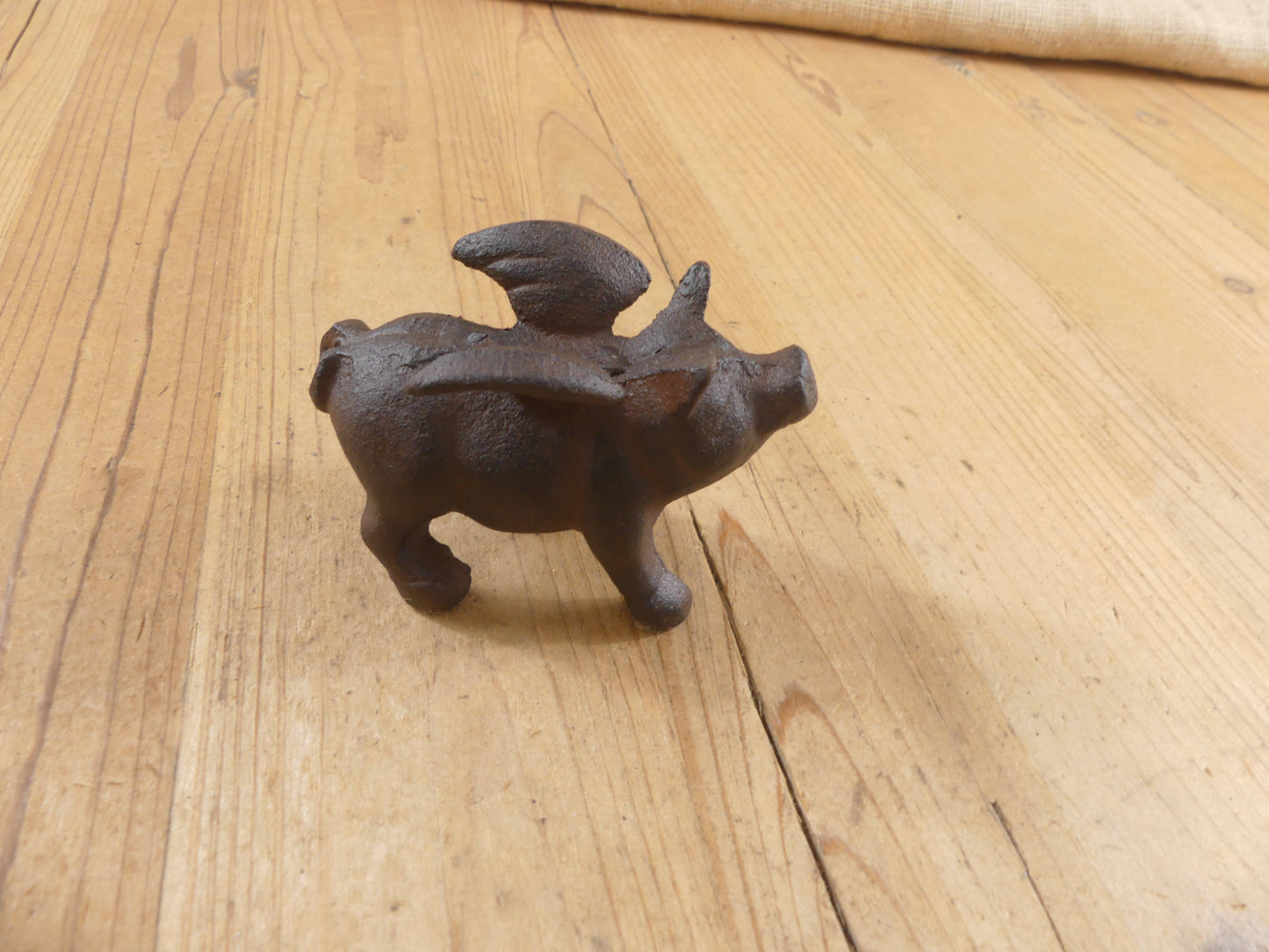 Flying Pig Cast Iron Decor: More Than Just a Paper Weight - The Mirrored Past
