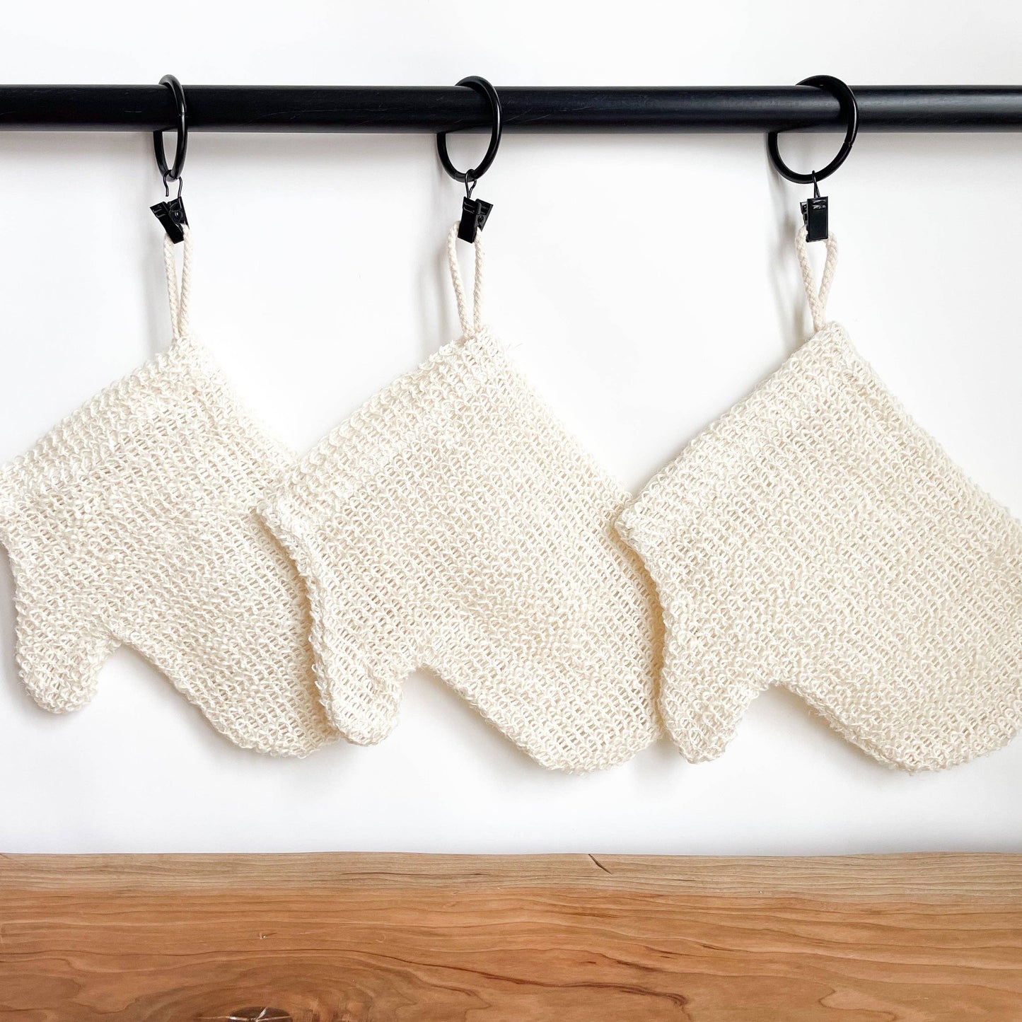 White mesh scrubber with a handle 