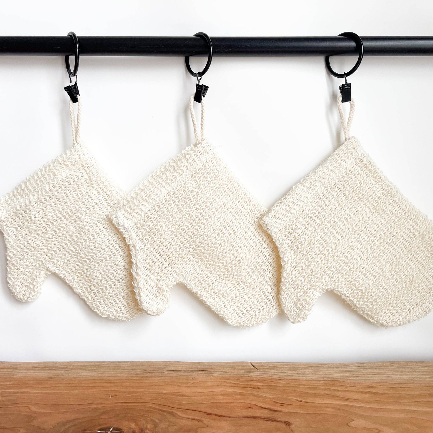 White mesh scrubber with a handle 