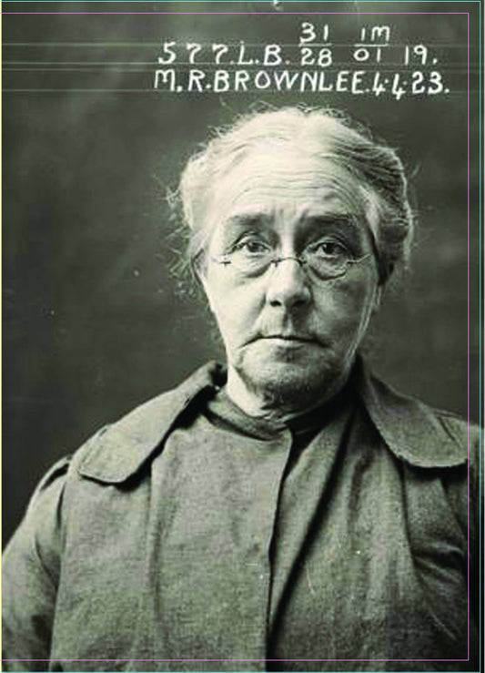 Black and white mugshot of an elderly woman with text overlay