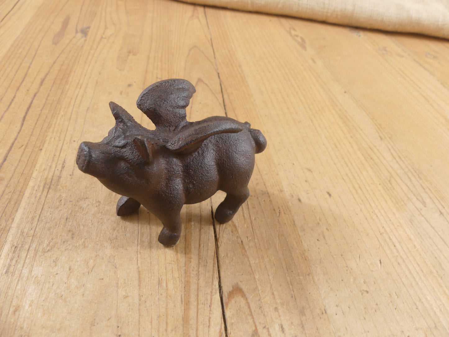 Flying Pig Cast Iron Decor: More Than Just a Paper Weight - The Mirrored Past