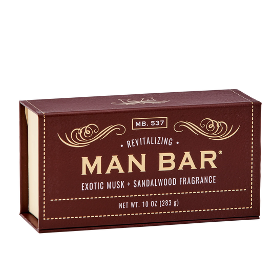 A packaged bar soap product with the branding 'MAN BAR' and text 'Exotic Musk & Sandalwood Fragrance' on the front.
